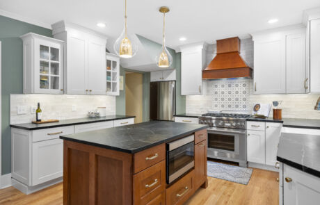 95BR – Kitchen – Full View Facing Cabinets, Range, and Island